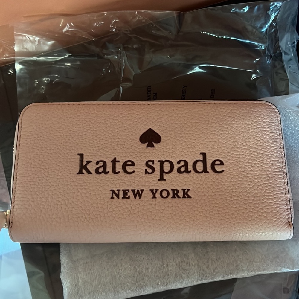 BRAND NEW pink Kate Spade wallet. Perfect for summer
